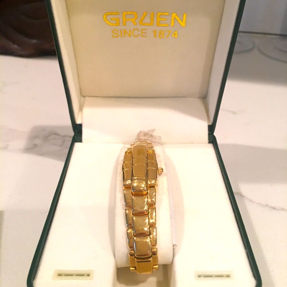 Gruen Watch. Gold Tone Slide Hatch